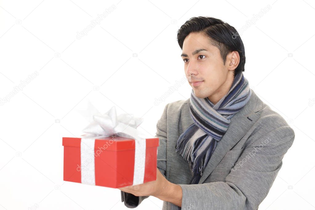 The man who smiles with a present