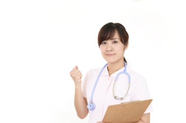 Mutlu bir şekilde pozlar kadın hemşire