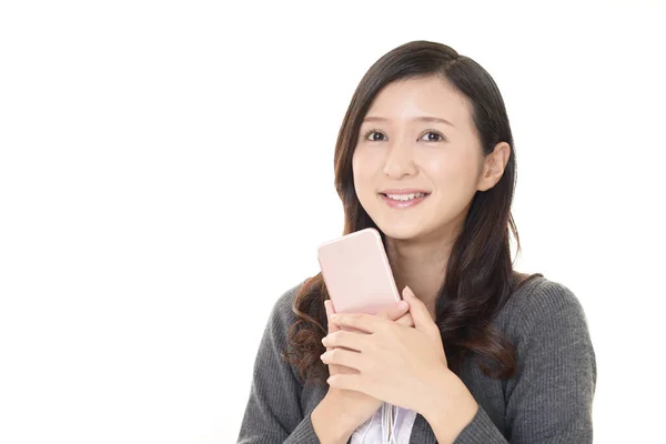 Smiling Woman Holding Smartphone — Stock Photo, Image