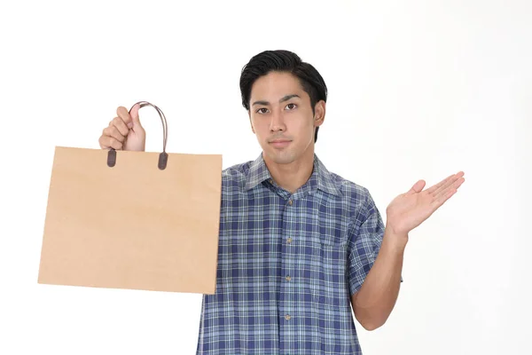 Joven Con Bolsa Compras —  Fotos de Stock