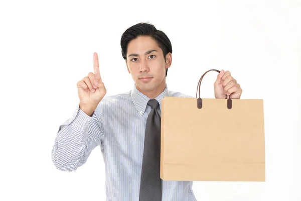 Hombre Sosteniendo Una Bolsa Compras —  Fotos de Stock