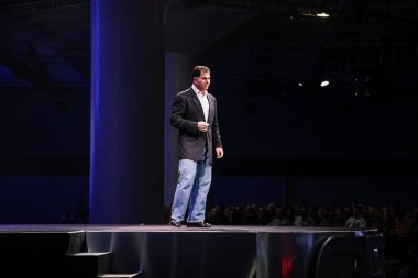 SAN FRANCISCO, CA, USA - NOV 14, 2007: CEO of Dell Technologies company Michael Dell makes his speech at Oracle OpenWorld conference in Moscone center on Nov 14, 2007 clipart