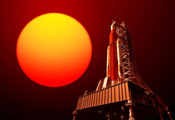 发射系统与红太阳 — 图库照片