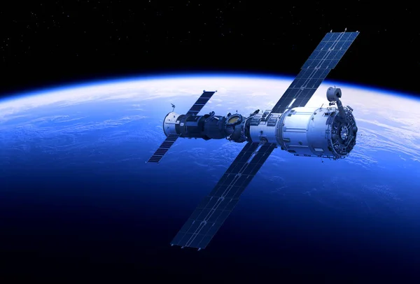 Космическая станция и космический корабль на орбите голубой планеты — стоковое фото