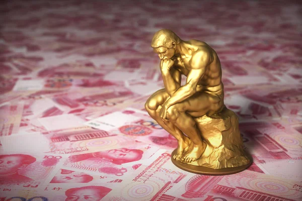 Goldskulptur Denker über Geld chinesische Yuan — Stockfoto