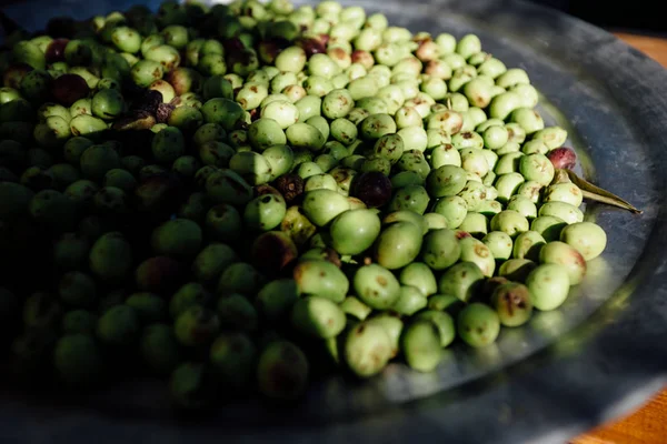 Fresh olives  harvest and in a making of fresh harvest. Natural light and composition.