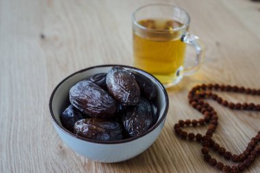 Dates Tea and Prayer beads. clipart