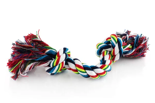 Kauwtabletten kleurrijke hond touw speelgoed met knopen. geïsoleerd op witte BAC — Stockfoto