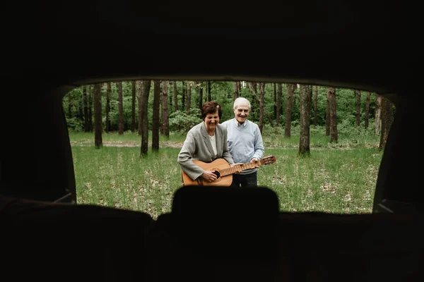 Loving Mature Couple Coming Picnic Guitar Happy Senior Couple Playing Royalty Free Stock Images