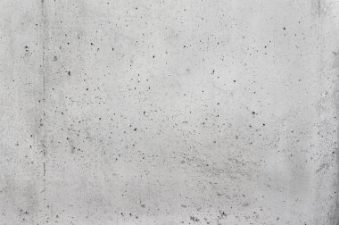 Küçük delikler doku kaplı gri beton duvar