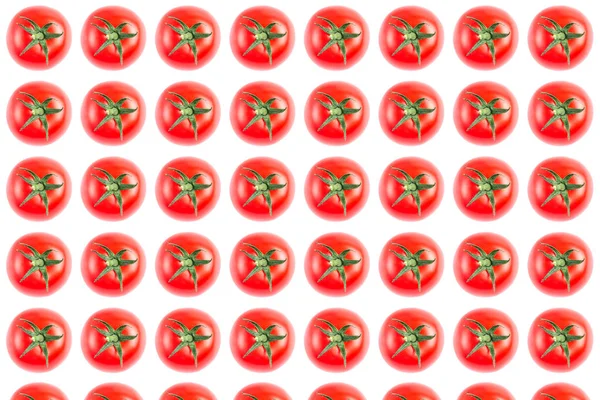Beyaz arka planda kırmızı domateslerin sebze deseni. İzole edilmiş — Stok fotoğraf