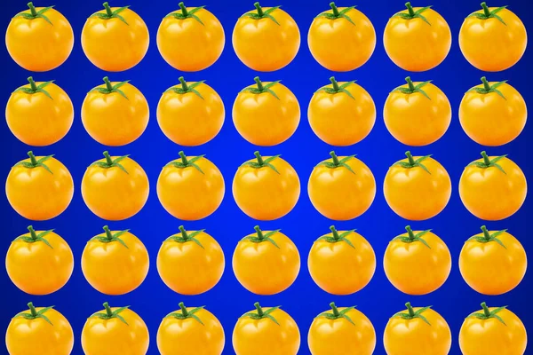 Vegetable pattern of yellow tomatoes on blue background. — Stok fotoğraf
