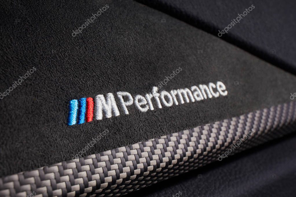 Katowice, Poland-06.30.2017 Logo M Performance embroidered on the suede dashboard of the BMW 430i