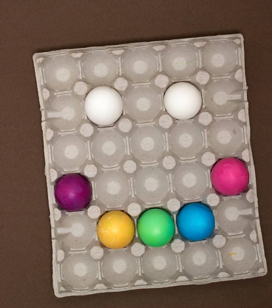 Creative happy smiley face. Easter eggs in tray — Stock Photo, Image
