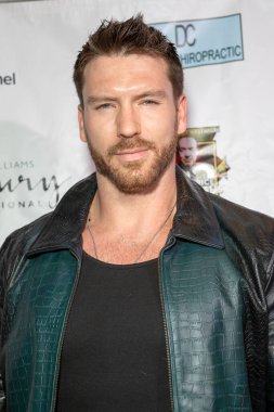 Jesse Kove arrives at the film premiere of 