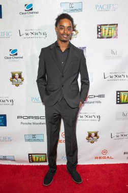 Eddie Rouse IV arrives at the film premiere of 