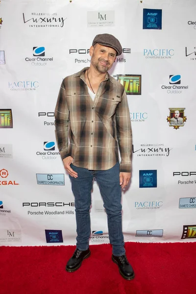 Devin McGee arrives at the film premiere of 