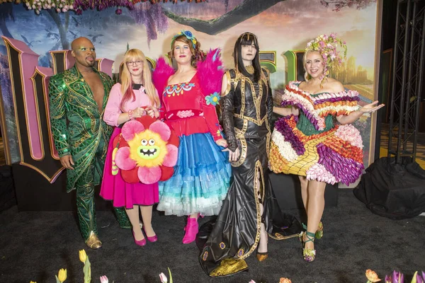 Michael James Scott, Designer Lynleigh Sato, unidentified model, Designer Caitlin Beards, Ashley Eckstein attend 11th Annual Her Universe Fashion Show, on the black carpet during Comic Con, at the Manchester Grand Hyatt Hotel on July 24, 2025.