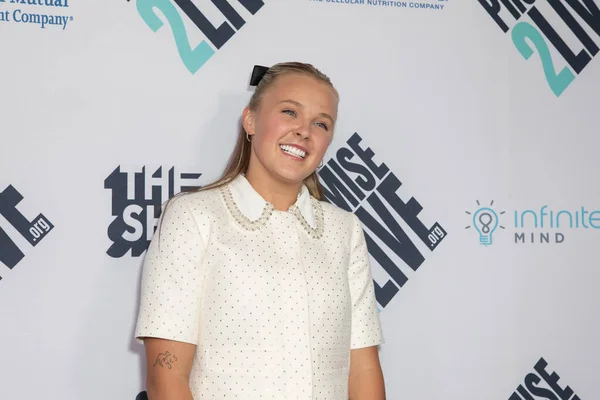 JoJo Swia arrives at the Promise2Live 4th Annual Global Livestream Show Gala on World Suicide Prevention Day at the Avalon Theater in Hollywood, CA on Sept. 10, 2025.