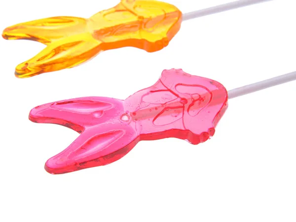 Piruletas. Dos caramelos de colores en un palo. Primer plano, aislado, recorte . — Foto de Stock