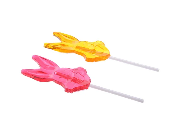 Piruletas. Dos caramelos de colores en un palo. Primer plano, aislado, recorte . — Foto de Stock