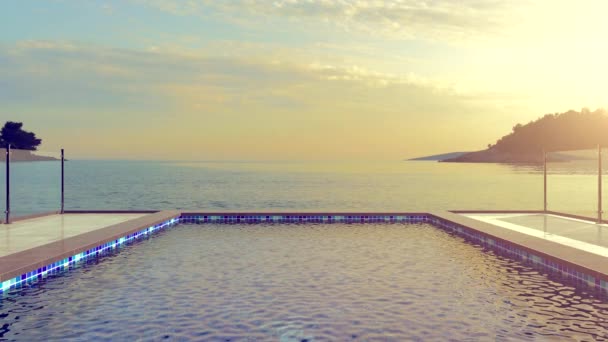 山の夕日 海沿いホテルのプール — ストック動画