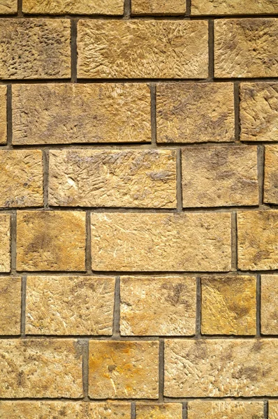 カラフルな石の壁の背景のクローズ アップ — ストック写真
