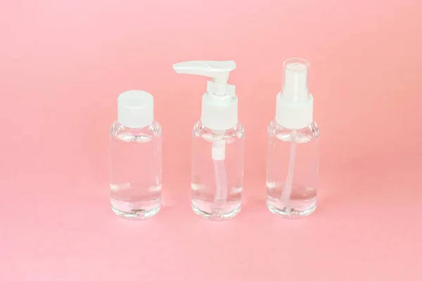 Kozmetika Üvegpalack Védjegyezési Gúnyolódni Pasztell Rózsaszín Háttér Elülső Nézete Csomag — Stock Fotó