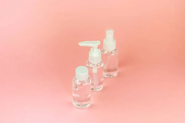 Kozmetika Üvegpalack Védjegyezési Gúnyolódni Pasztell Rózsaszín Háttér Elülső Nézete Csomag — Stock Fotó