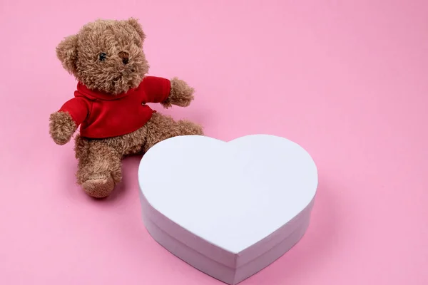 Teddy bear, white box hearts shaped, Valentines Day gift. Present for the christmas, thanks giving day, birthday holiday.