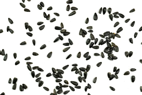 Семена подсолнечника, фон или текстура изолированы на белом. lose-up . — стоковое фото