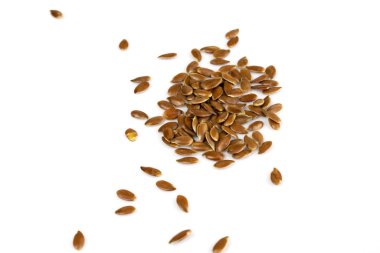 Keten tohumu, keten tohumu, keten, beyaz üzerine izole edilmiş linum. Vegan diyet ve sağlıklı beslenme kavramı.