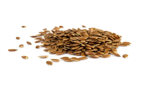 Montón de semillas de lino, semillas de lino en blanco. Dieta y alimentación saludable . — Foto de Stock