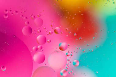 Soyut arka plan, renkli degrade renkler. Suda yağ damlaları.