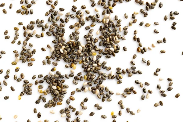 Superfood semillas de chía, vista superior, aislado sobre fondo blanco. Desayuno saludable, snack vitamínico, dieta y concepto de alimentación saludable . — Foto de Stock