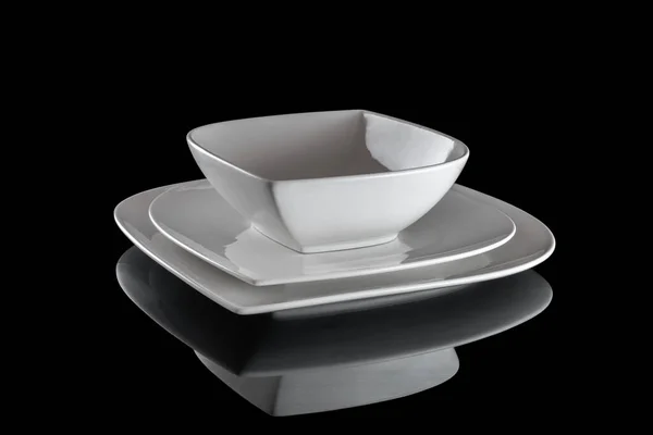 Λευκό Πιάτο Άδειο Για Τρόφιμα Που Απομονώνονται Μαύρο Στρογγυλό Πιάτο — Φωτογραφία Αρχείου