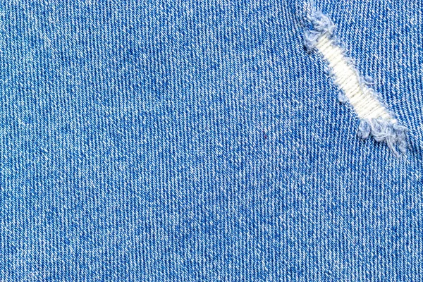 Погляд на синій фон зблизька. Структура Жана деніма для одягу моди з копіювальним простором. Текстильна тканина — стокове фото