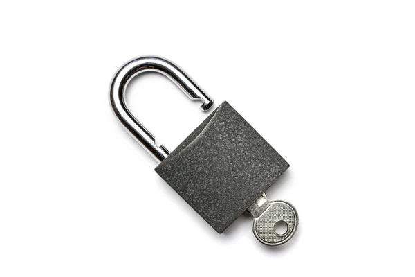 Key isolated. Metal lock pad or padlock on white background. Privacy security concept. — Stock Photo, Image