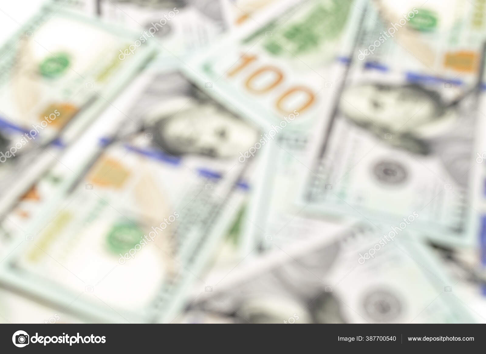 美元符号抽象模糊背景.美国钱。1亿张纸钞放在软管里,通常是钞票.Usa货币模糊不清. ——图库图片© Mvelishchuk #387700540