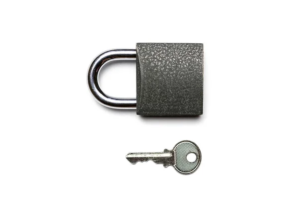 Security padlock. Metal lock pad with key isolated on white background. — Stock Photo, Image