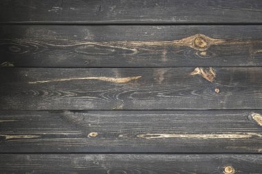 Tahta arka plan. Fotokopi alanı olan siyah tahılı masa. Eski ahşap şablon. Vintage grunge duvar kağıdı için kereste yüzey duvarı. Doğal malzeme arkaplanı.