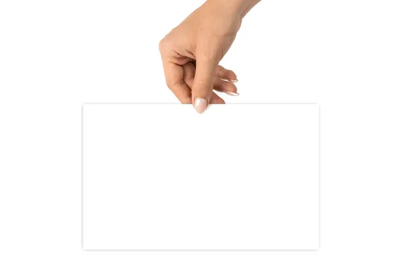 Hand holding card. Hand holding blank business paper card isolated on white background. Empty credit template in person arm. — Stock Photo, Image