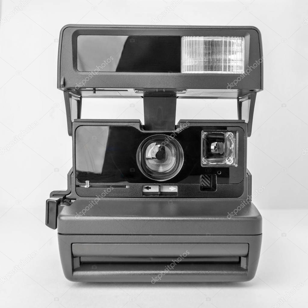 Close Up Instant Camera. Instant camera isolated on white background.