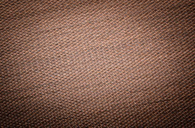 Eğimli kahverengi altın soyut ızgara, örgü modeli, tek renkli geometrik doku.