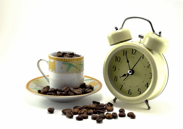 Bej siyah oklar ve bir kadar kahve çekirdekleri ile tarz Çalarsaat, antika.