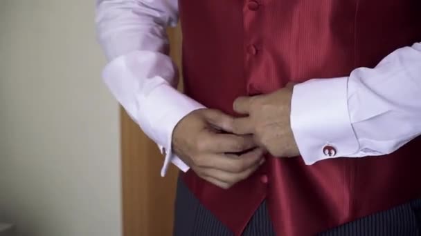 Groom Fastens Buttons Vest Only Hands Visible — Stock Video