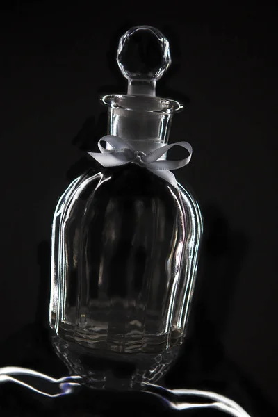Parfume Glass Bottle White Ribbon Black Background — Stock Photo, Image