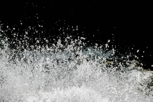 Salpicadura de agua sobre fondo negro — Foto de Stock