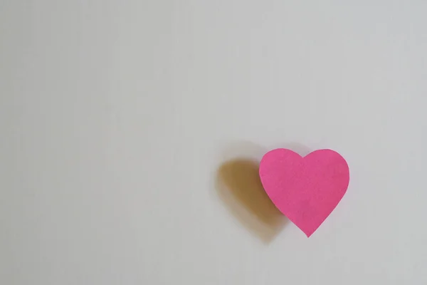 Love concept: Paper heart shape on white background — Stock Photo, Image