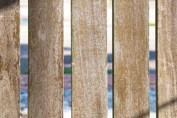 Textura de fondo: tablones de madera con agujeros en el medio —  Fotos de Stock